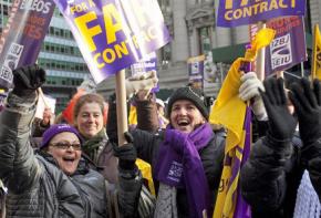 Members of SEIU Local 32BJ celebrate a tentative agreement