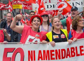 French workers march during the day-long general strike against labor law "reform"